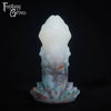 A fantasy sex toy on a black background with the Fantasy Grove logo in the upper left corner