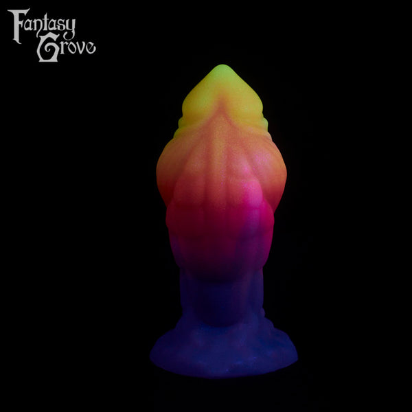 A fantasy sex toy on a black background with the Fantasy Grove logo in the upper left corner