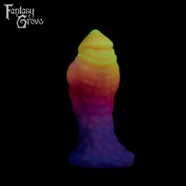 A fantasy sex toy on a black background with the Fantasy Grove logo in the upper left corner