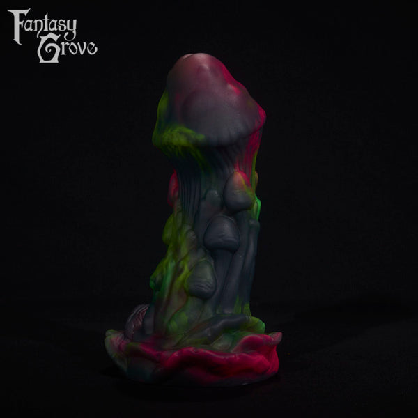 A fantasy sex toy on a black background with the Fantasy Grove logo in the upper left corner