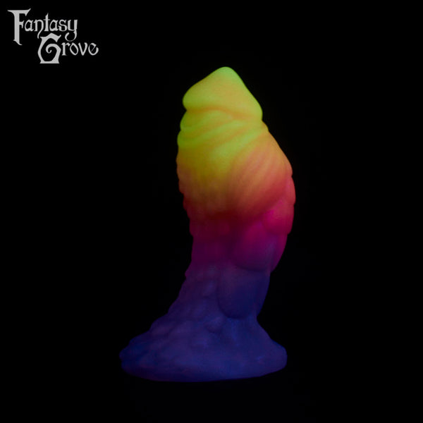 A fantasy sex toy on a black background with the Fantasy Grove logo in the upper left corner