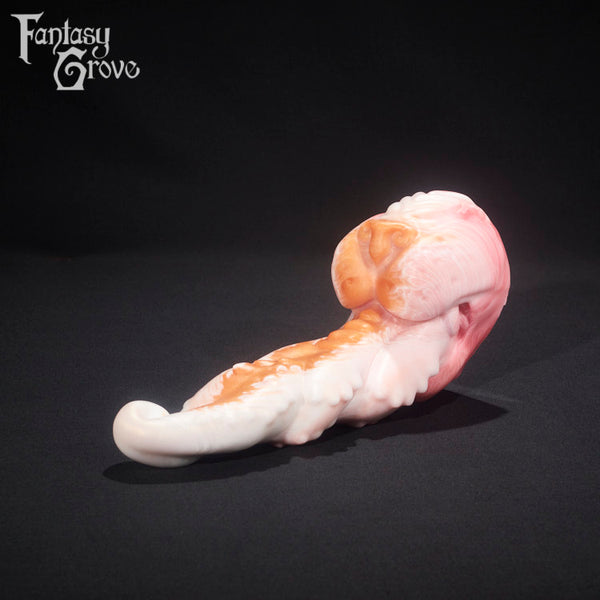 A fantasy sex toy on a black background with the Fantasy Grove logo in the upper left corner 