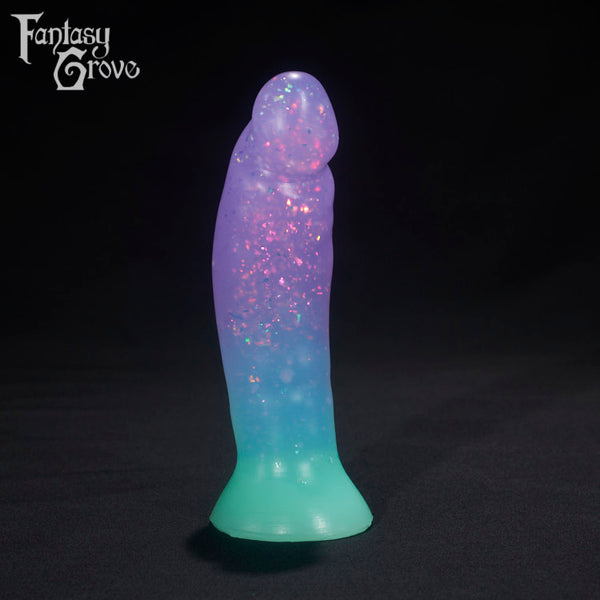 A Fantasy Grove sex toy on a black background with a logo in the upper left corner