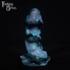 A fantasy sex toy on a black background with the Fantasy Grove logo in the upper left corner