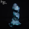 A fantasy sex toy on a black background with the Fantasy Grove logo in the upper left corner