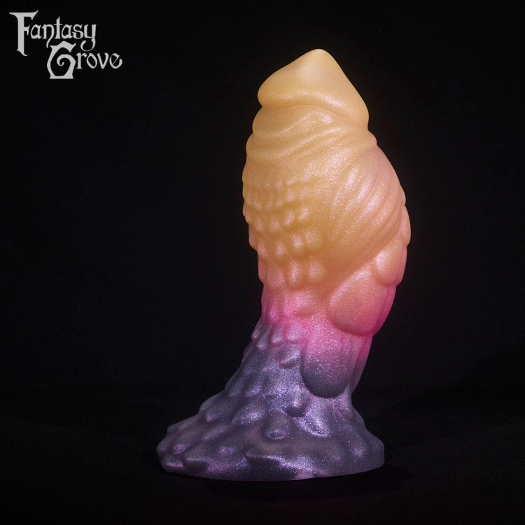 A fantasy sex toy on a black background with the Fantasy Grove logo in the upper left corner
