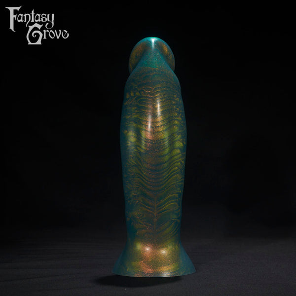 A Fantasy Grove sex toy on a black background with a logo in the upper left corner
