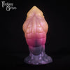 A fantasy sex toy on a black background with the Fantasy Grove logo in the upper left corner