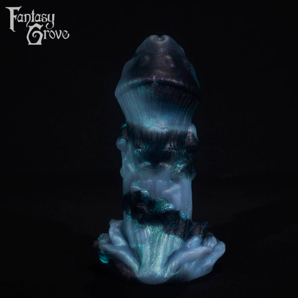 A fantasy sex toy on a black background with the Fantasy Grove logo in the upper left corner