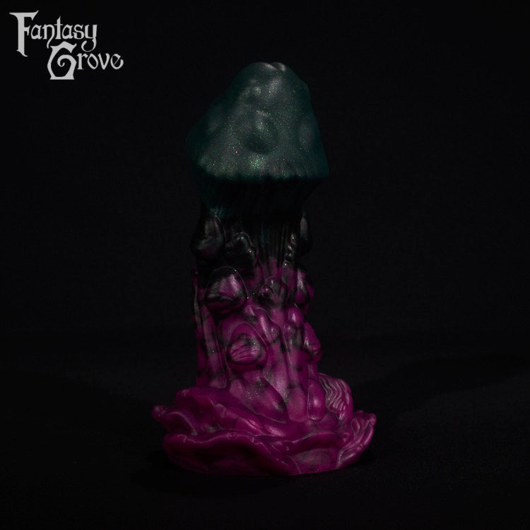 A fantasy sex toy on a black background with the Fantasy Grove logo in the upper left corner