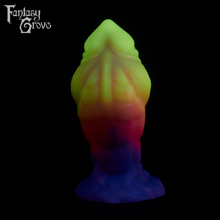 A fantasy sex toy on a black background with the Fantasy Grove logo in the upper left corner