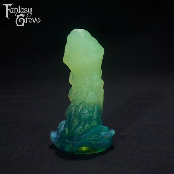 A fantasy sex toys on a black background with Fantasy Grove branding