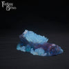 A Fantasy Grove sex toy on a black background with a logo in the upper left corner