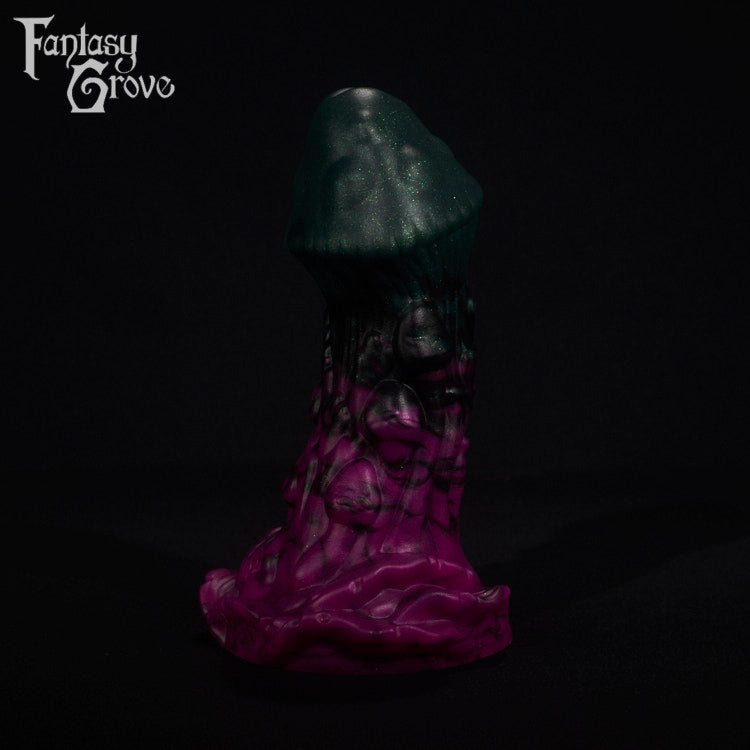 A fantasy sex toy on a black background with the Fantasy Grove logo in the upper left corner