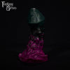 A fantasy sex toy on a black background with the Fantasy Grove logo in the upper left corner