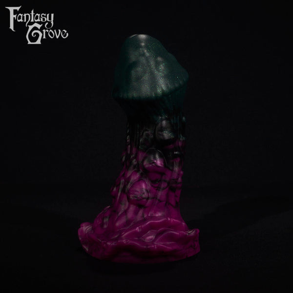 A fantasy sex toy on a black background with the Fantasy Grove logo in the upper left corner
