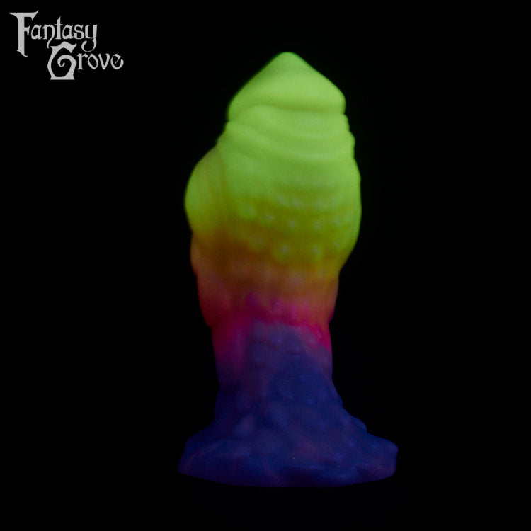 A fantasy sex toy on a black background with the Fantasy Grove logo in the upper left corner