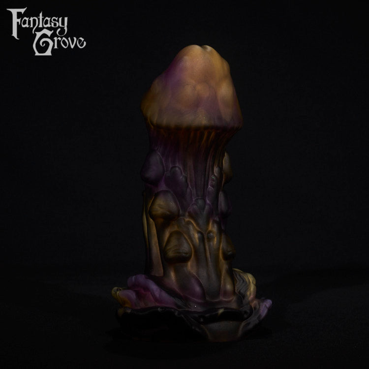 A fantasy sex toy on a black background with the Fantasy Grove logo in the upper left corner
