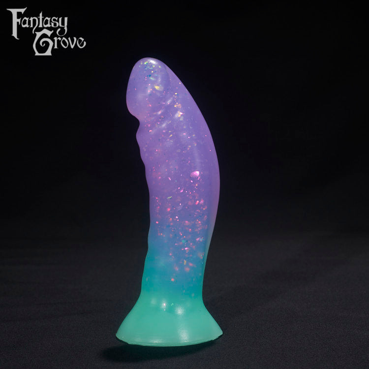 A Fantasy Grove sex toy on a black background with a logo in the upper left corner