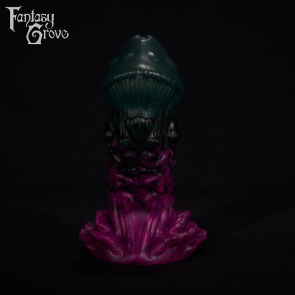 A fantasy sex toy on a black background with the Fantasy Grove logo in the upper left corner