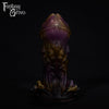 A fantasy sex toy on a black background with the Fantasy Grove logo in the upper left corner