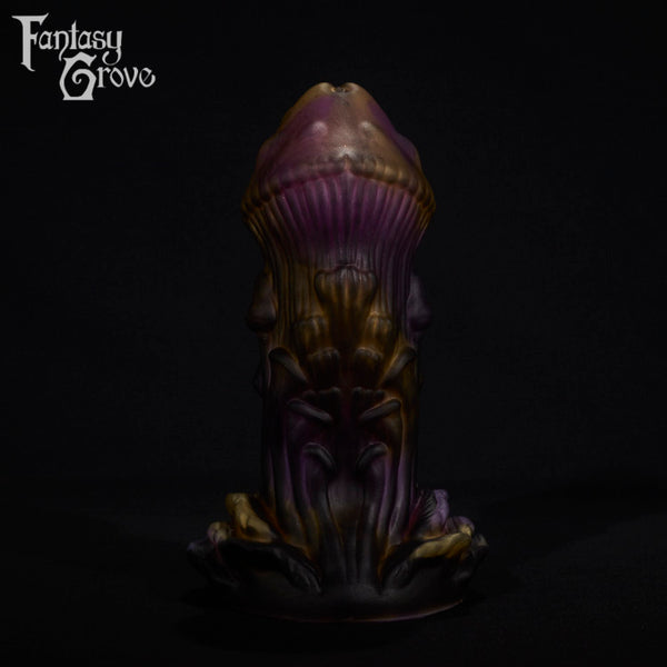 A fantasy sex toy on a black background with the Fantasy Grove logo in the upper left corner