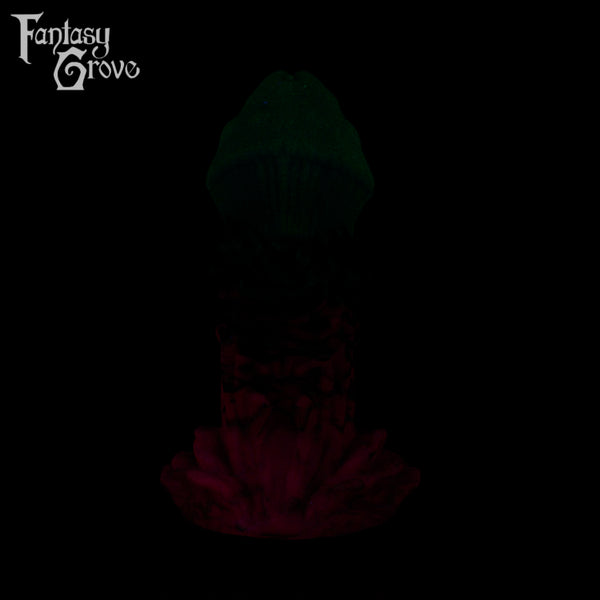A fantasy sex toy on a black background with the Fantasy Grove logo in the upper left corner