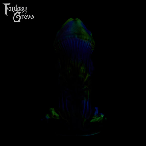 A fantasy sex toy on a black background with the Fantasy Grove logo in the upper left corner