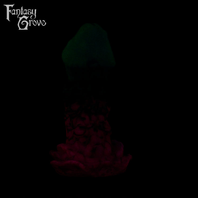 A fantasy sex toy on a black background with the Fantasy Grove logo in the upper left corner