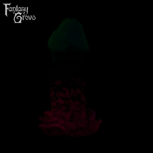 A fantasy sex toy on a black background with the Fantasy Grove logo in the upper left corner