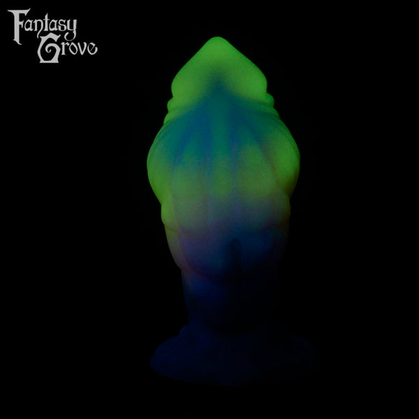 A fantasy sex toy on a black background with the Fantasy Grove logo in the upper left corner