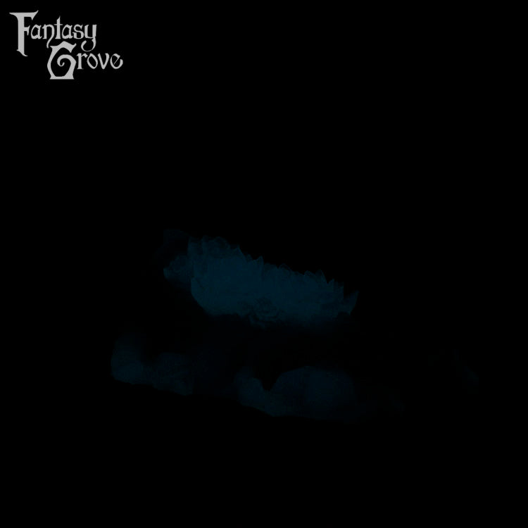 A Fantasy Grove sex toy on a black background with a logo in the upper left corner