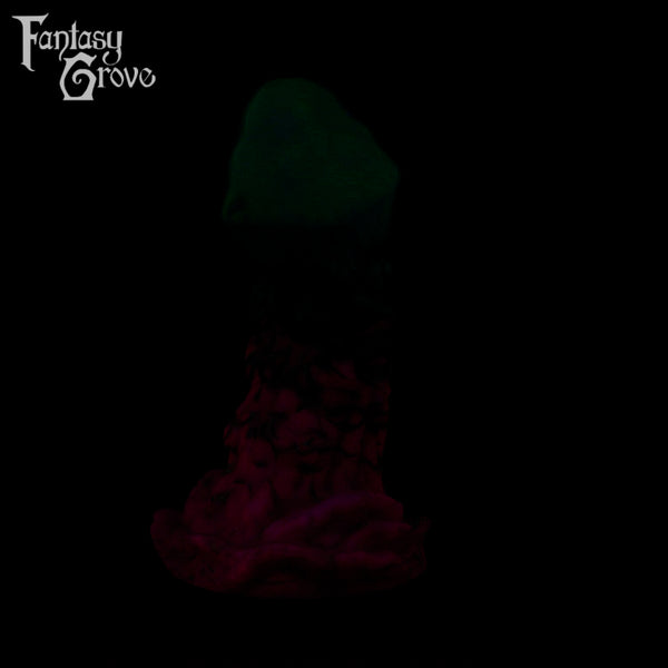 A fantasy sex toy on a black background with the Fantasy Grove logo in the upper left corner