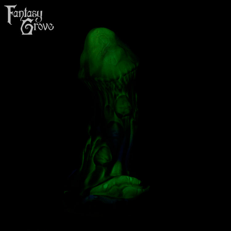 A fantasy sex toy on a black background with the Fantasy Grove logo in the upper left corner