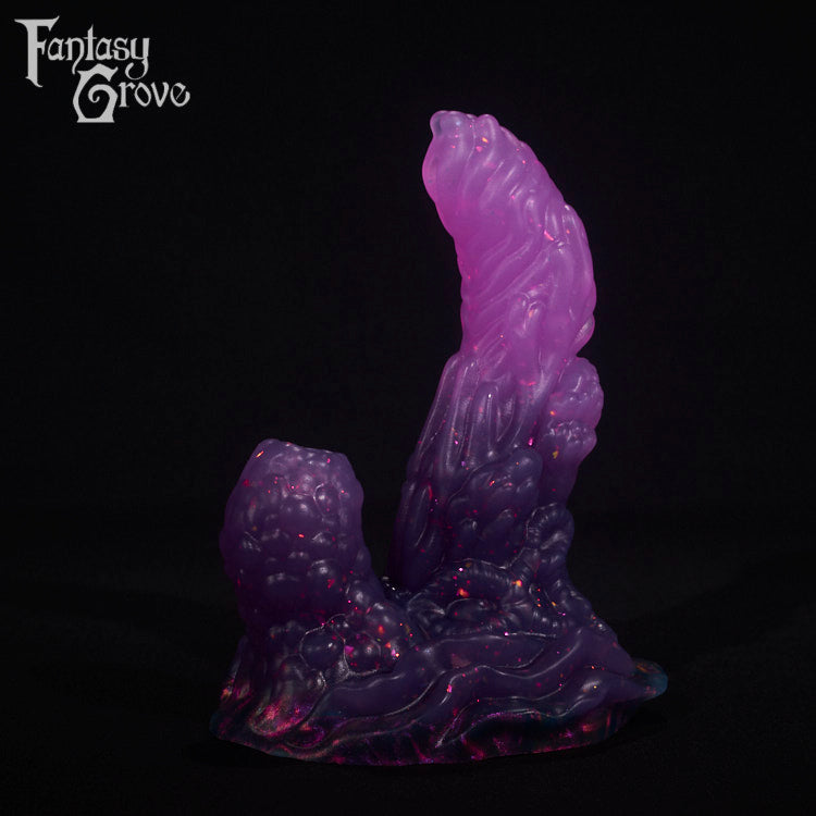 A fantasy sex toy on a black background with the Fantasy Grove logo in the upper left corner