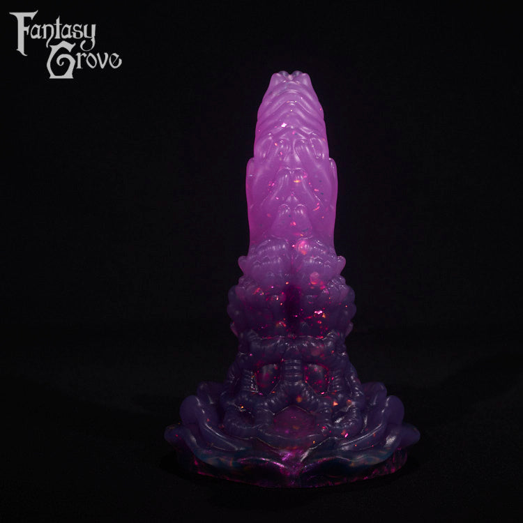 A fantasy sex toy on a black background with the Fantasy Grove logo in the upper left corner
