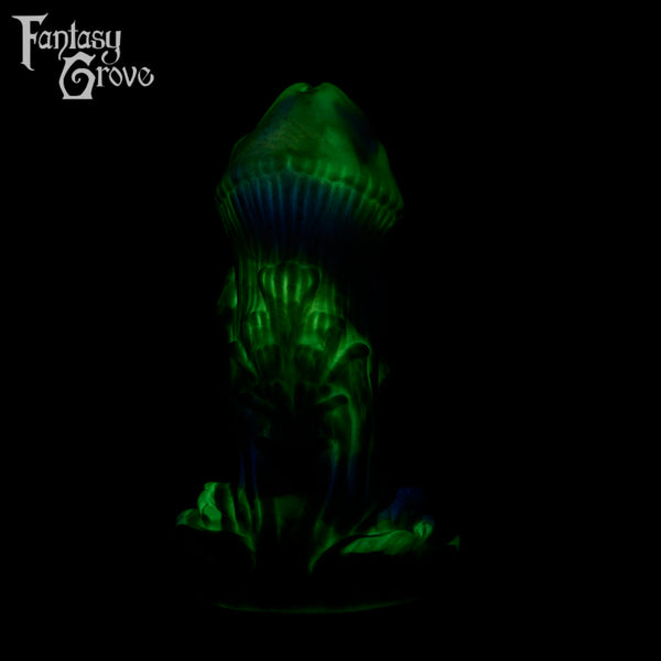 A fantasy sex toy on a black background with the Fantasy Grove logo in the upper left corner