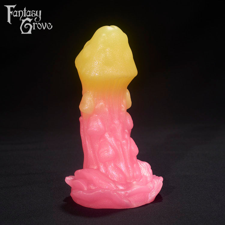 A fantasy sex toys on a black background with Fantasy Grove branding