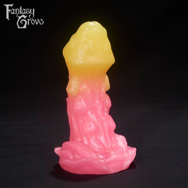 A fantasy sex toys on a black background with Fantasy Grove branding