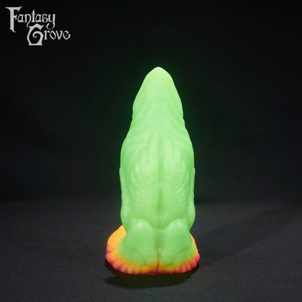 A fantasy sex toy on a black background with the Fantasy Grove logo in the upper left corner 