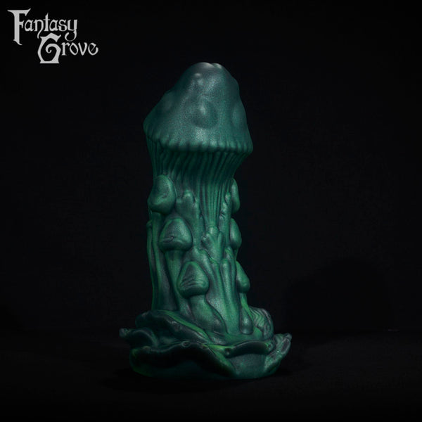 A fantasy sex toy on a black background with the Fantasy Grove logo in the upper left corner
