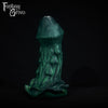 A fantasy sex toy on a black background with the Fantasy Grove logo in the upper left corner