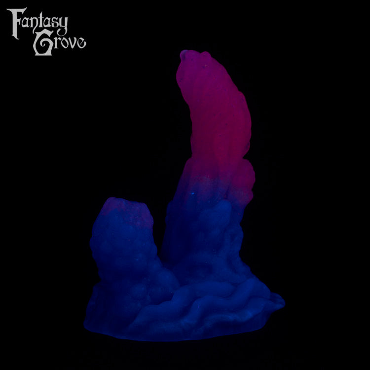 A fantasy sex toy on a black background with the Fantasy Grove logo in the upper left corner