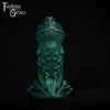 A fantasy sex toy on a black background with the Fantasy Grove logo in the upper left corner