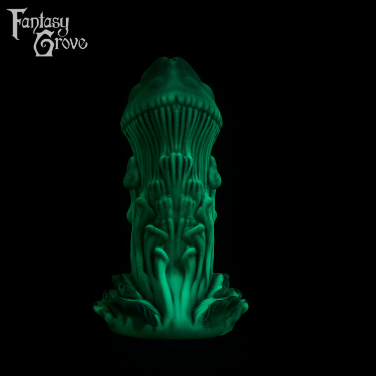 A fantasy sex toy on a black background with the Fantasy Grove logo in the upper left corner