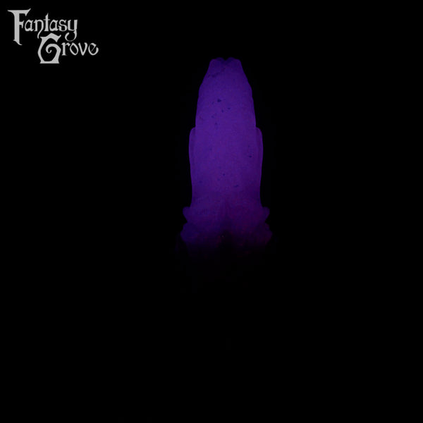A fantasy sex toy on a black background with the Fantasy Grove logo in the upper left corner