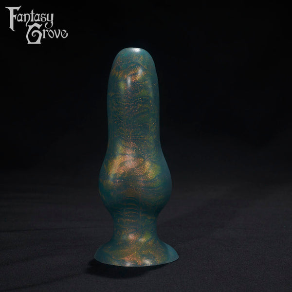 A Fantasy Grove sex toy on a black background with a logo in the upper left corner