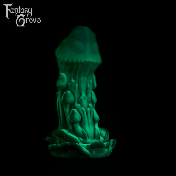 A fantasy sex toy on a black background with the Fantasy Grove logo in the upper left corner