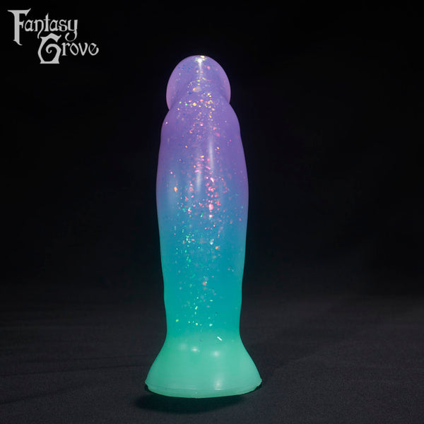 A Fantasy Grove sex toy on a black background with a logo in the upper left corner