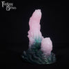 A fantasy sex toy on a black background with the Fantasy Grove logo in the upper left corner